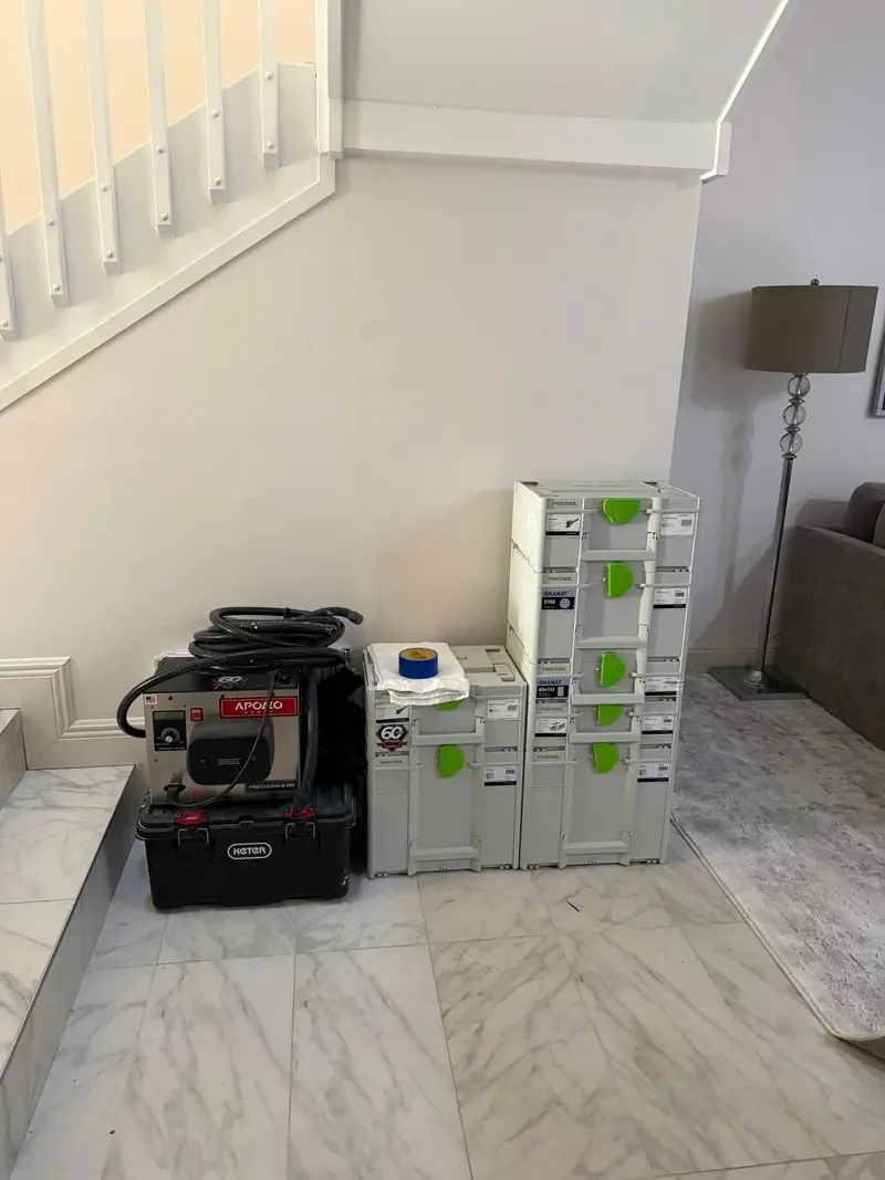 Dust-extraction and spray equipment set up inside the home