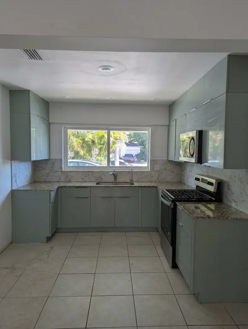 North Miami kitchen with refinished cabinet boxes matched to new custom doors